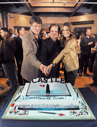 Castle’s cast and crew, including Marlowe, flanked by Nathan Fillion and Stana Katic, celebrated the series’ 100th episode in February 2013. The milestone show aired on April 1 of that year. Photo: ERIC McCANDLESS/ABC